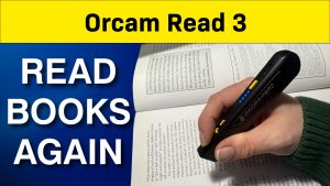 YouTube thumbnail of Orcam Read 3 showing a handheld reading device scanning text from an open book, with large text that says “Read Books Again” on a blue background.